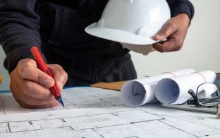 Blueprints and hard hats