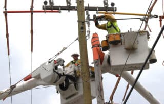 Lineman working on an electrical pole